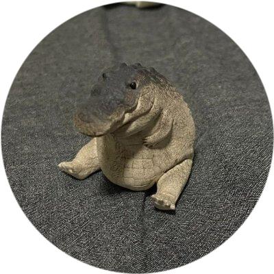 Gomu Gator logo